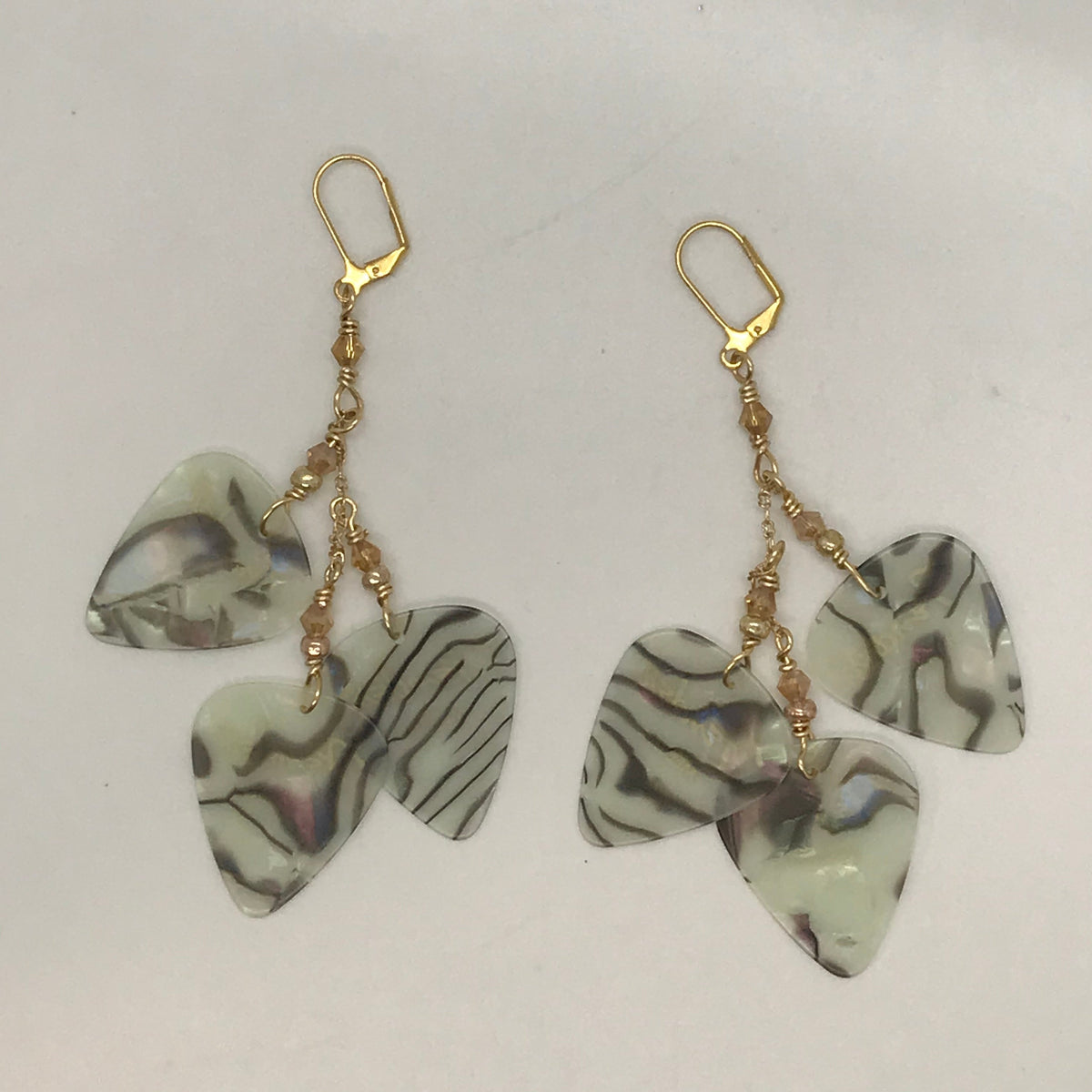 Handmade guitar-pick earrings from Michalen's Wearable Art