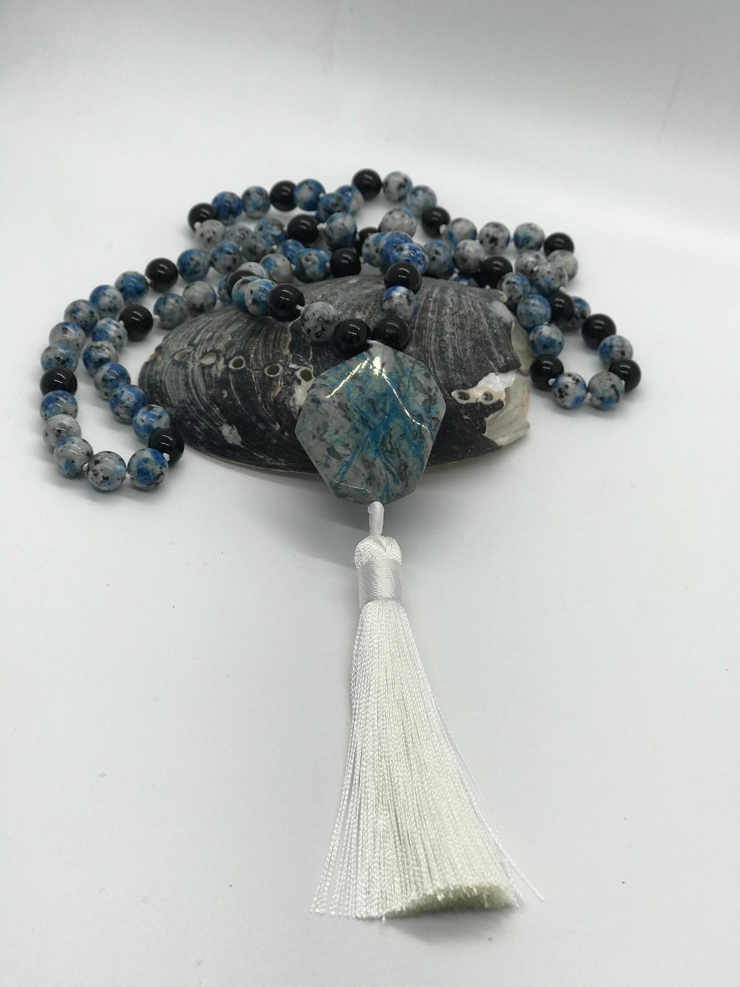 Mala prayer beads created with Blue Spotted Agate beads