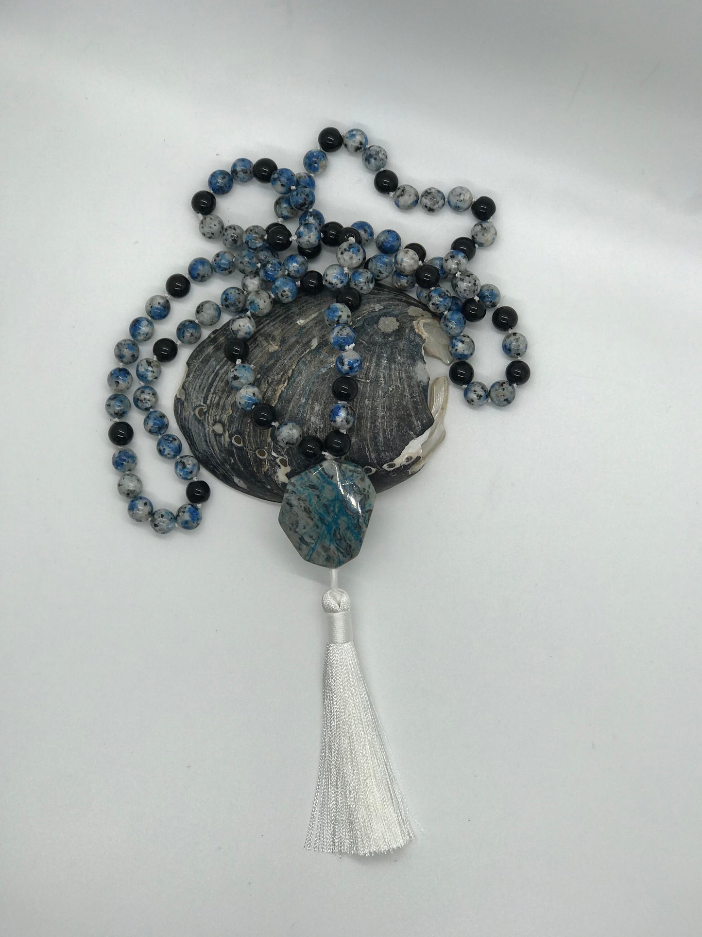 Mala prayer beads created with Blue Spotted Agate beads