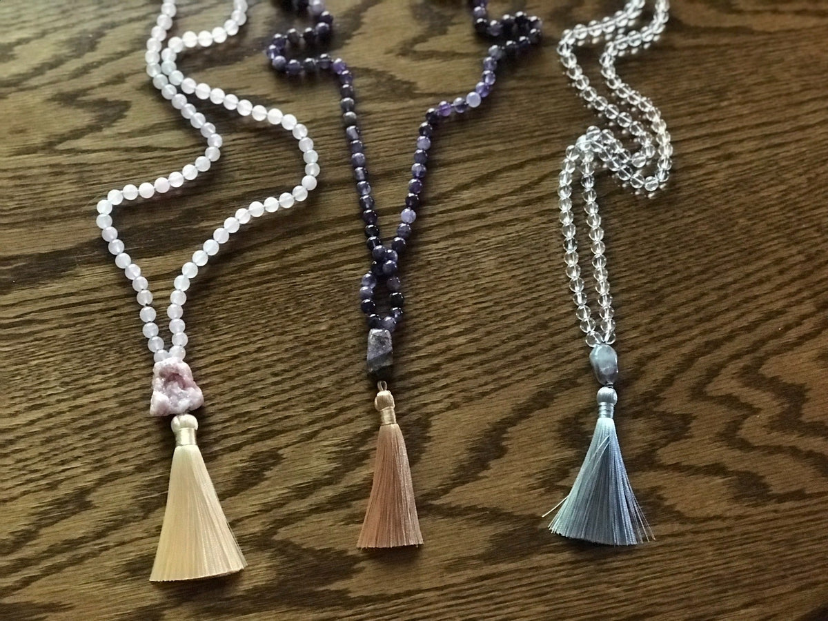 Example malas with peach, copper and gray tassels