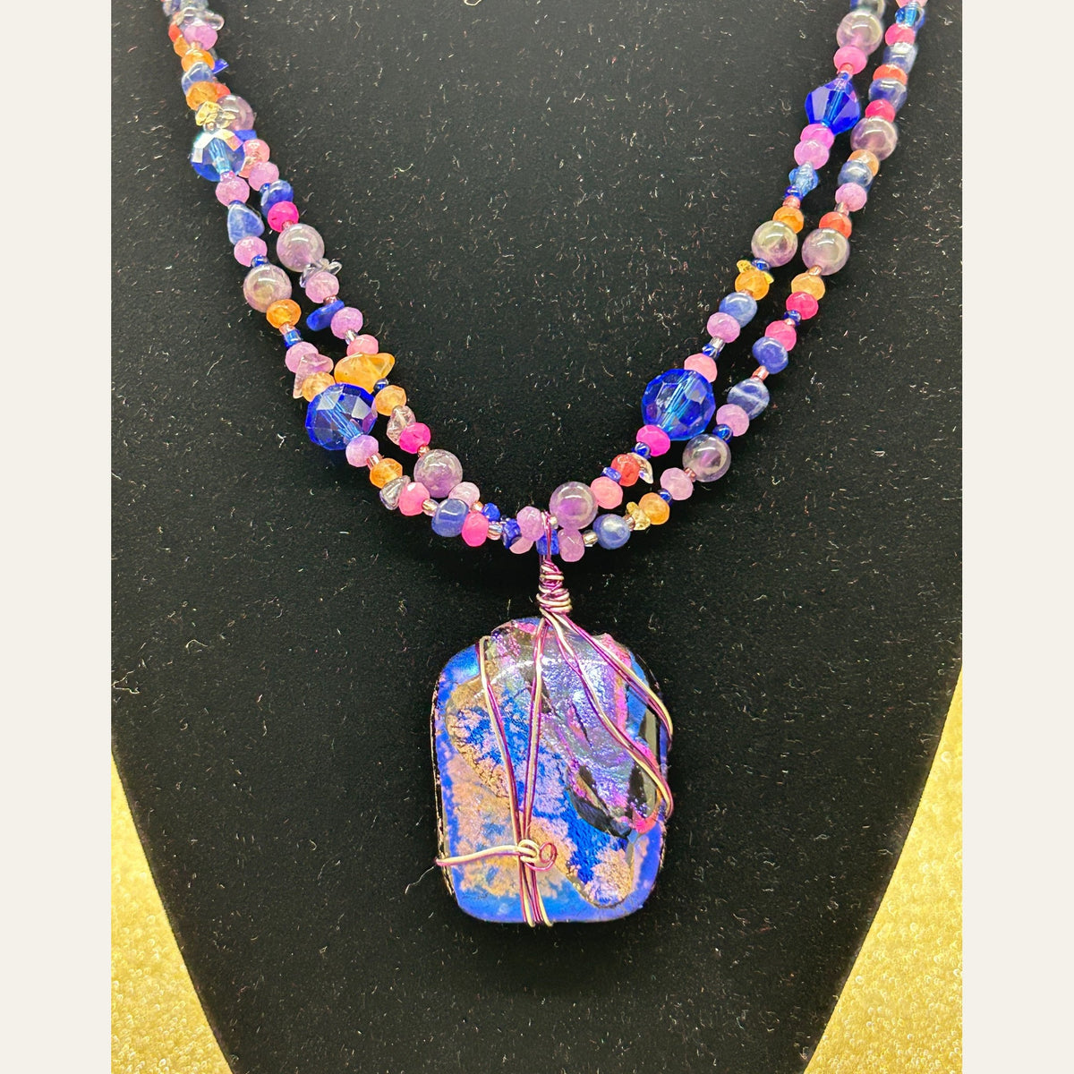 Electric blue and violet handmade dichroic glass necklace, photograph 3