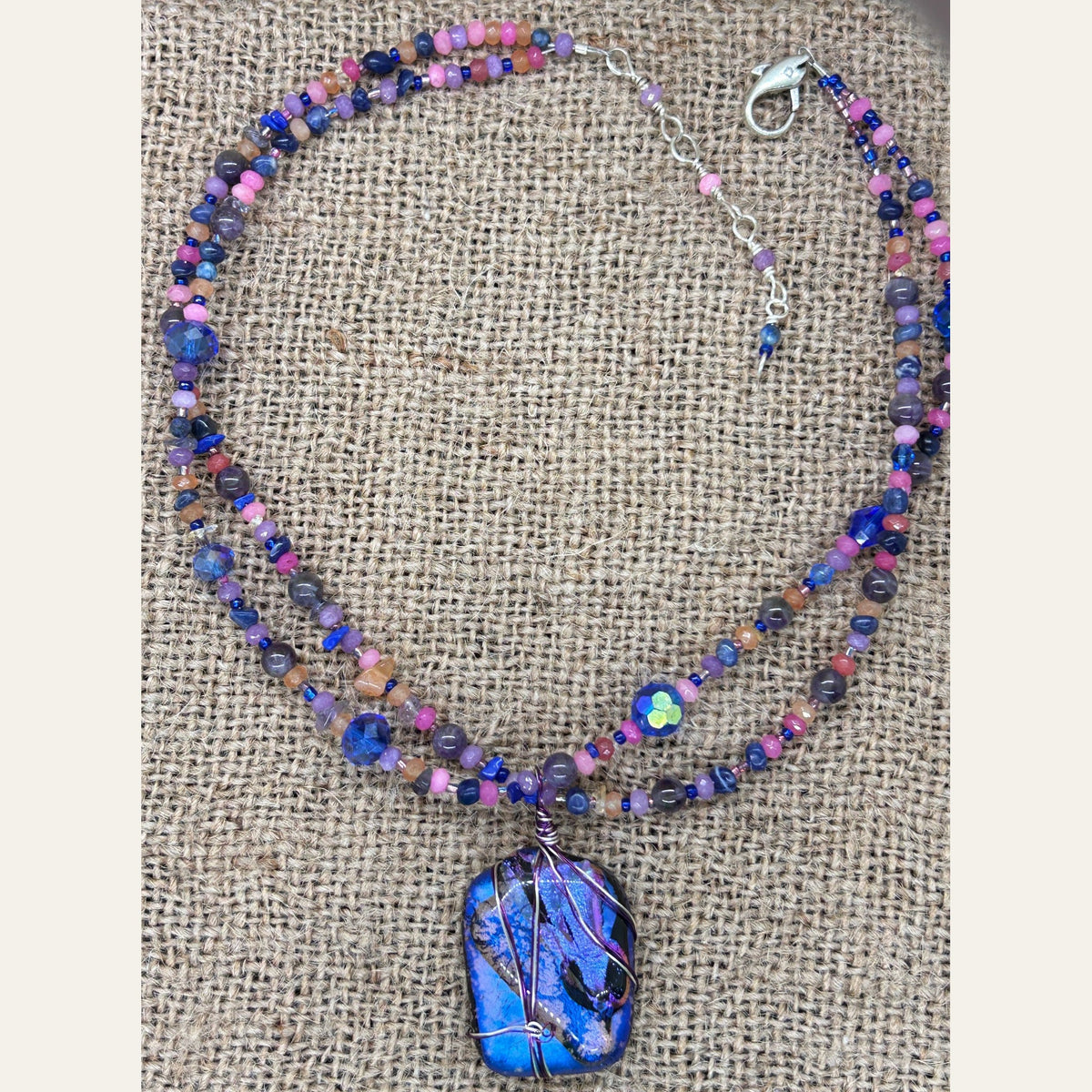 Electric blue and violet handmade dichroic glass necklace, photograph 5